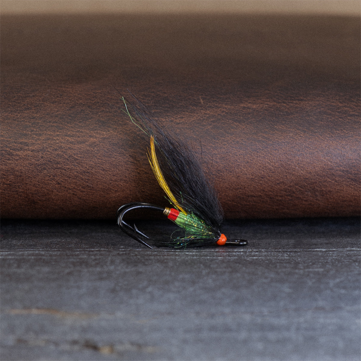 An Atlantic salmon fly named the Overtaker that is popular in Eastern Canada for Atlantic salmon fly fishing, tied here on a double hook.