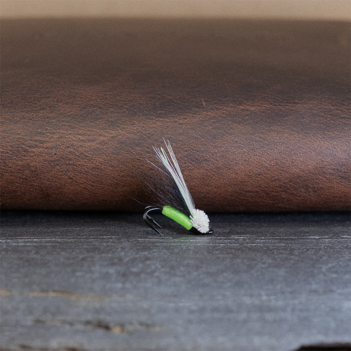 An Atlantic salmon fly named the Trottinette Muddlerhead, a variant by Félix Lamoureux, tied here on a double hook.