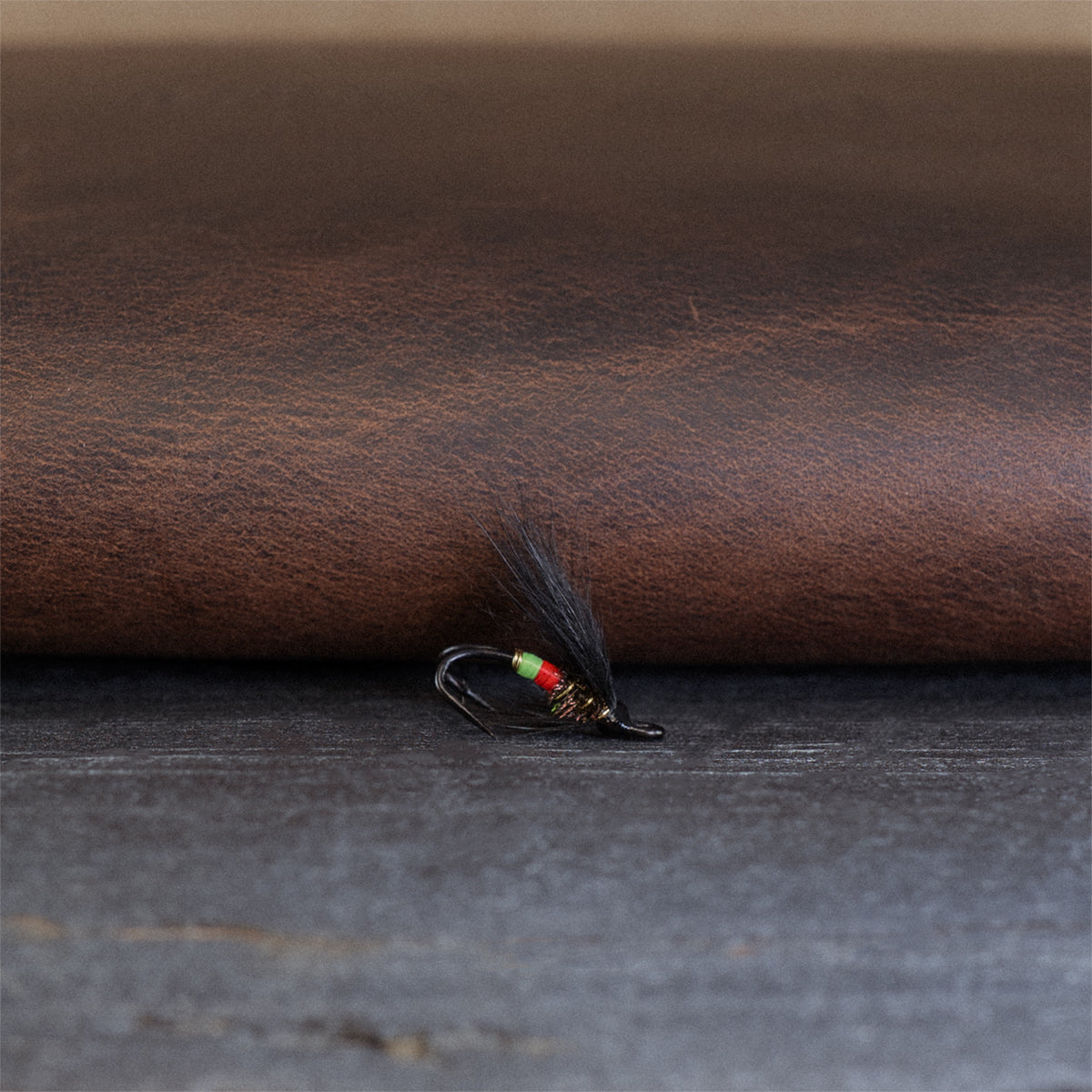 An Atlantic salmon fly named the Undertaker that is popular in Eastern Canada for Atlantic salmon and steelhead fly fishing, tied here on a double hook.