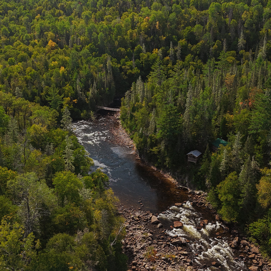 Aerial view of a salmon pool on the Petit Saguenay River in Quebec, captured by drone.