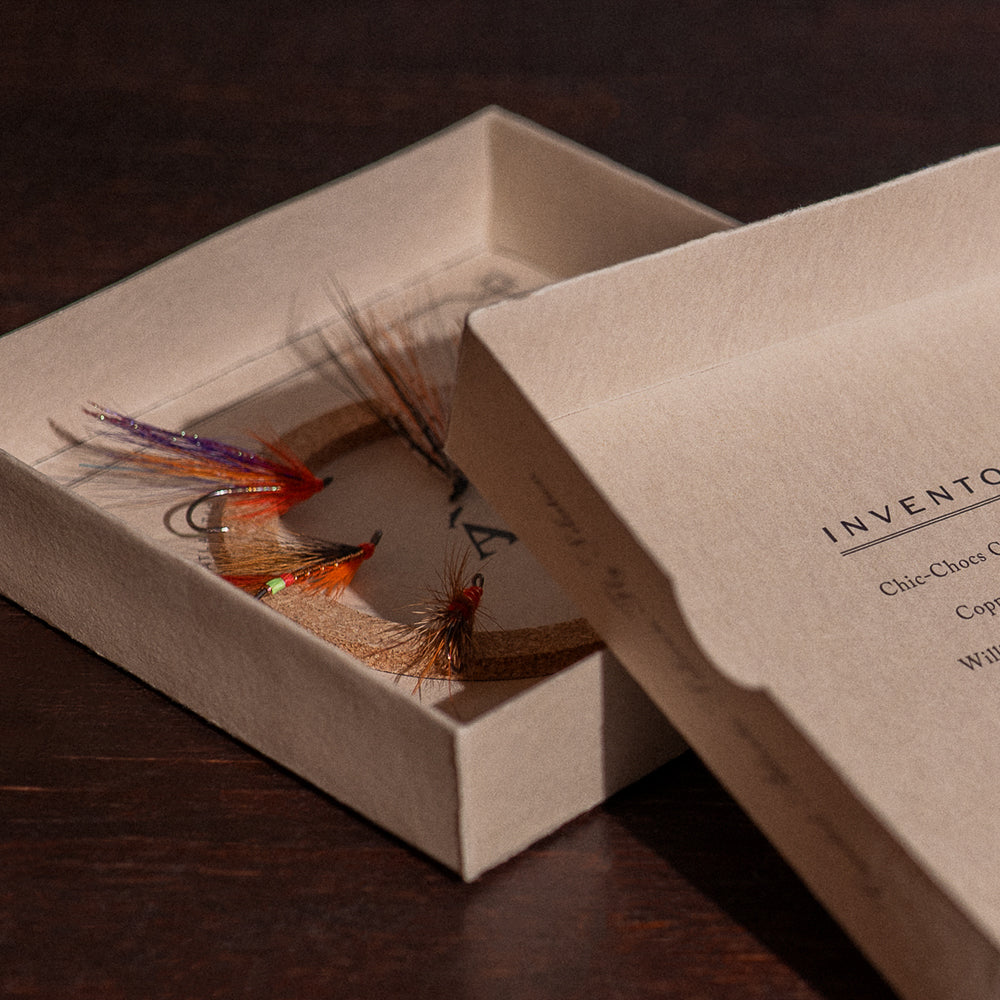 Ánadröm Fall Run fly box open, inventory lid listing Chic-Chocs and other Atlantic salmon fly patterns.